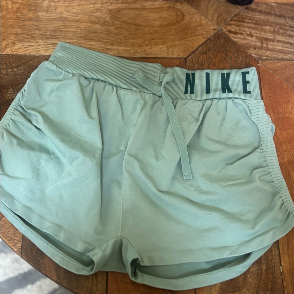 Nike kid’s medium Athletic Shorts in Light Green